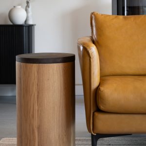 Round side table with removable coffee shell top revealing hidden storage compartment with fabric interior