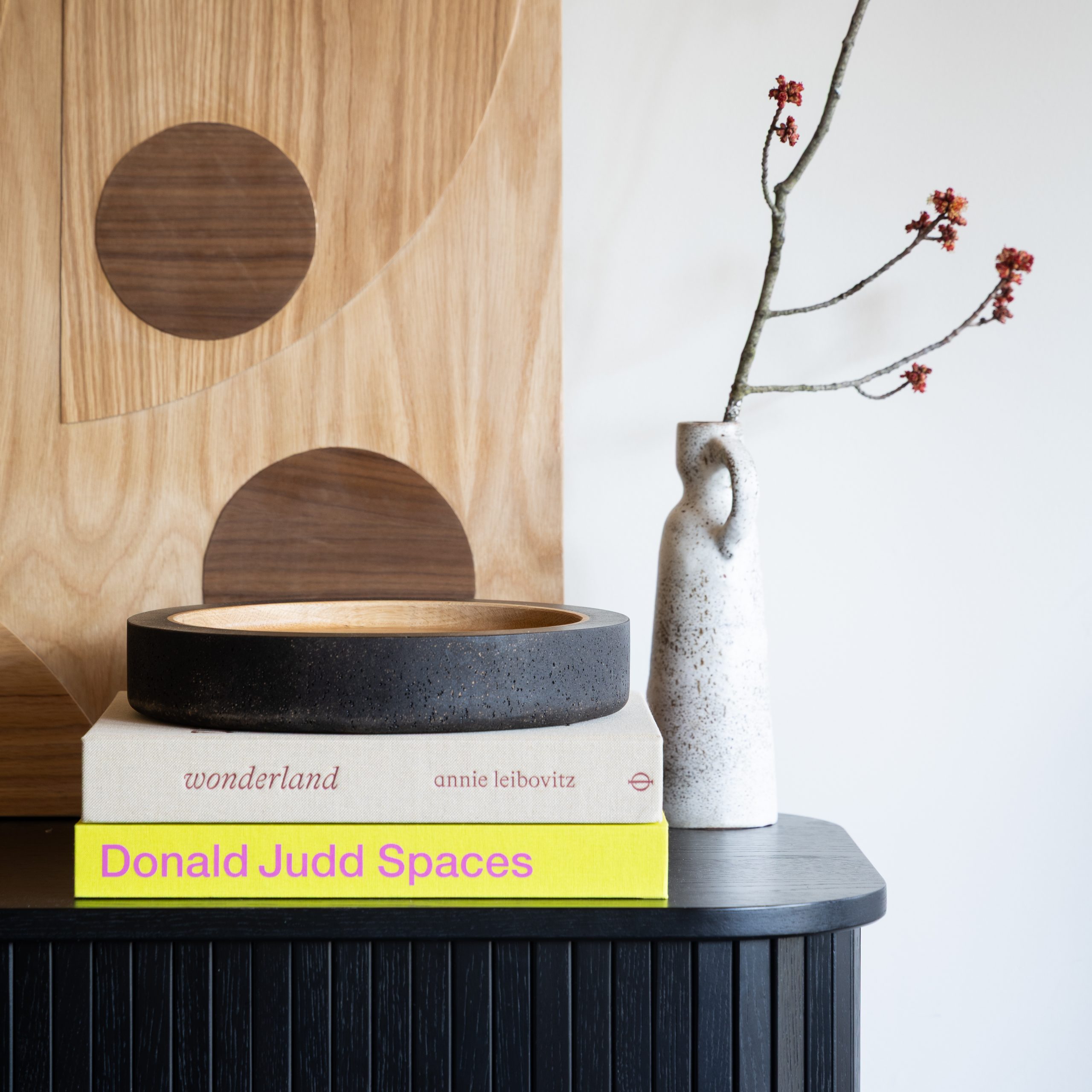 Round wooden bowl with coffee ground texture